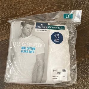 Tall crew new 100% cotton white tshirts.  Large tall. 4 in pack